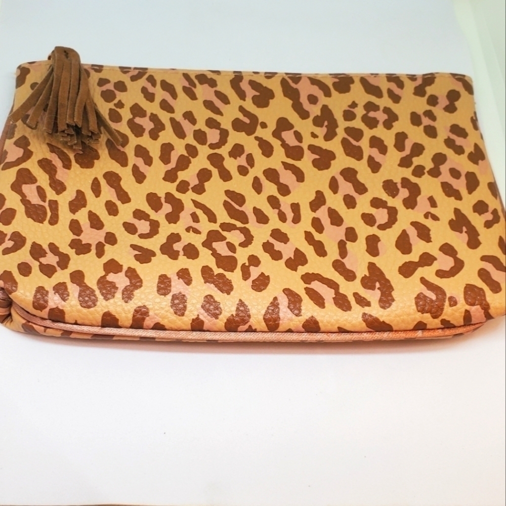 Ispy brown and pink animal print themed makeup pouch